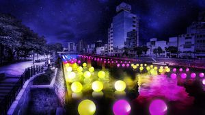 新町川に光る球体を浮かべる作品のイメージ図（実行委提供）